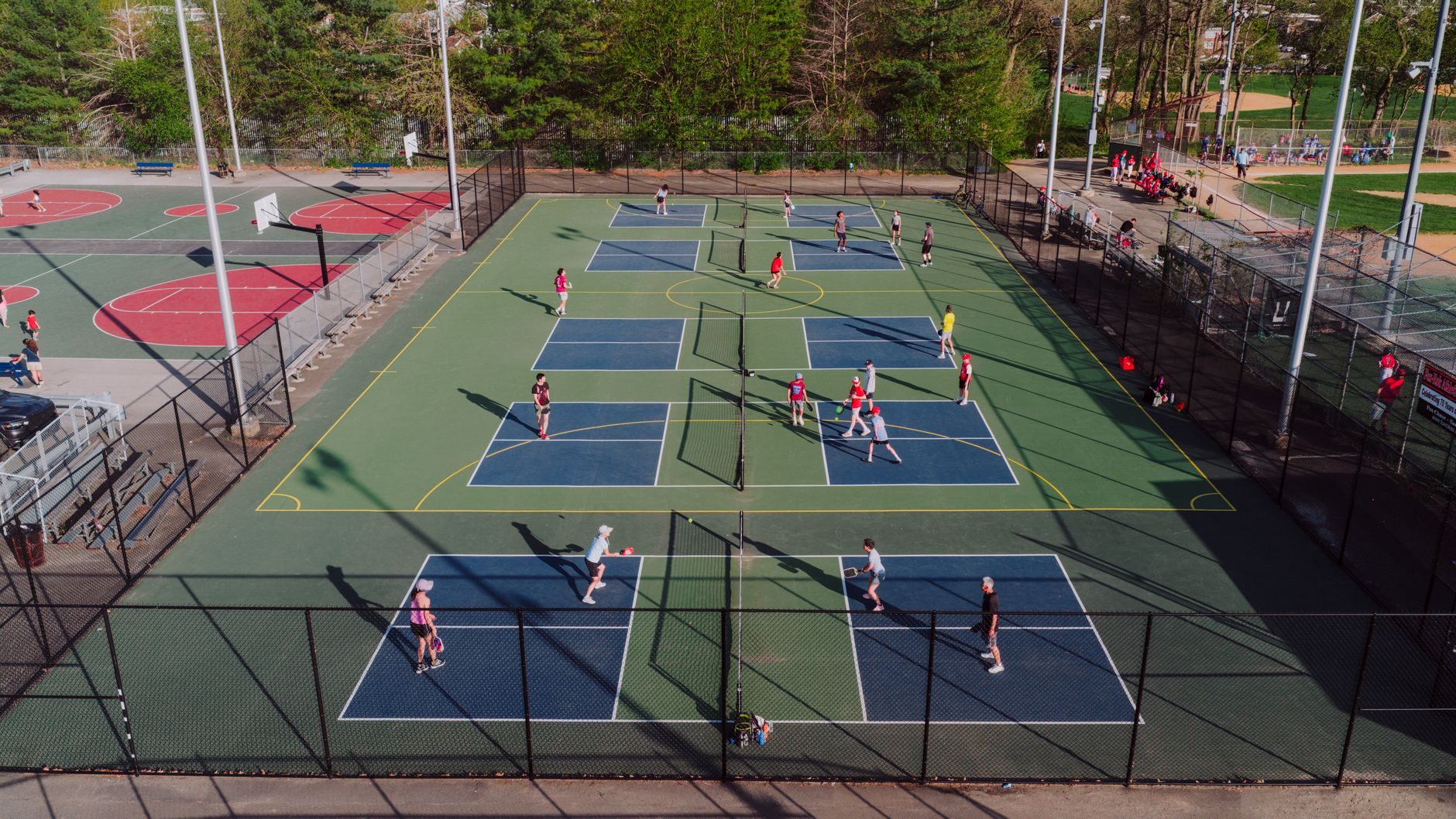 Pickleball court with painted lines and net