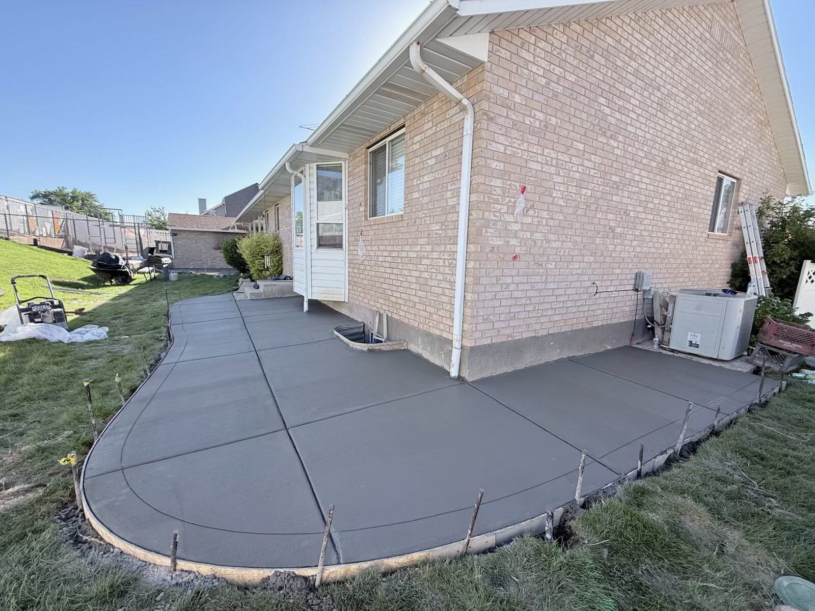 Colored concrete patio in a Utah backyard