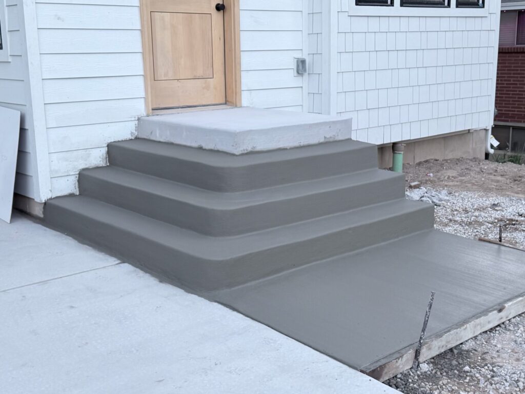 Poured concrete front steps and stoop