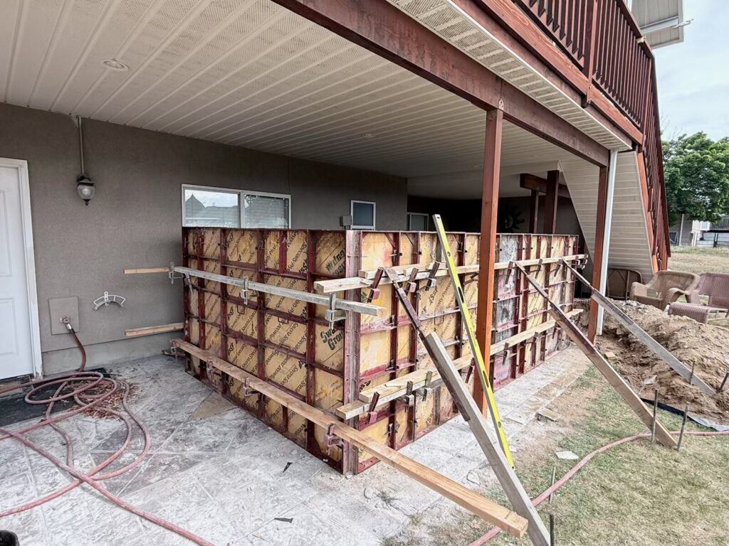 Covered concrete patio under construction